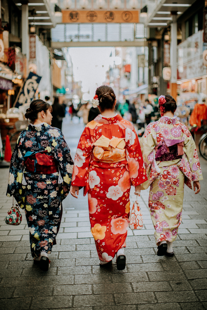 Women Wearing Kimono Walking on the Street Together